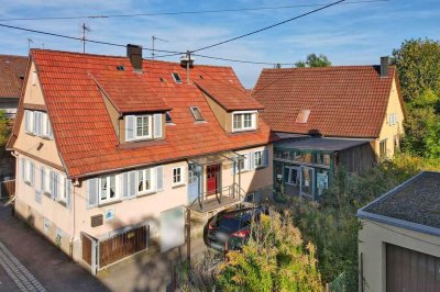 Exklusives Grundstück im Herzen von Plieningen! Bebaut mit einem Doppelhaus und großer Werkstatt.