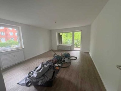 Sanierte 3-Zimmer Wohnung mit Einbauküche und eigenem Garten
