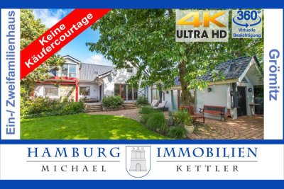 Moderne Großzügigkeit für Ihre Familie – mit Einliegerwohnung, 4 Bädern & großem Garten in Grömitz