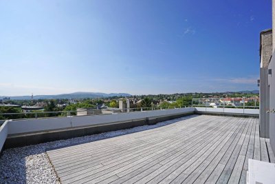 Penthouse-Wohnung / 131 m² Wfl. | 80 m² Dachterrasse mit 270°-Ausblick / PKW-Stellplatz / riesiger Gemeinschaftsgarten / im Zentrum