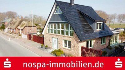 Gepflegtes Einfamilienhaus mit Terrasse, Garage und vielen Extras mehr auf der Insel an Land