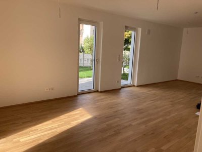 Helle Neubauwohnung mit Garten in bester Lage – Baujahr 2022