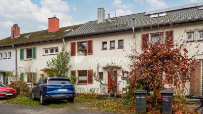 Charmantes Reihenhaus von 1954 mit Garten, Garage und moderner Dachsanierung auf Erbpachtgrundstück