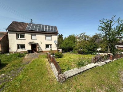 Einfamilienhaus mit einem Traum von Grundstück