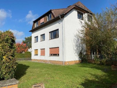Ruhiges Wohnidyll: Mehrfamilienhaus mit drei Einheiten und großem Garten