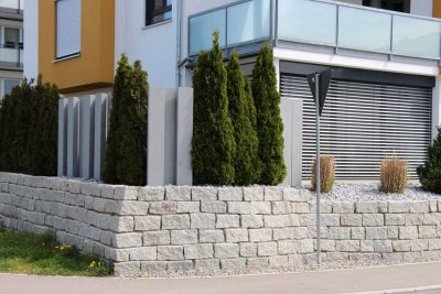 Attraktive 3,5-Zimmer-Wohnung mit Wintergarten und Garten