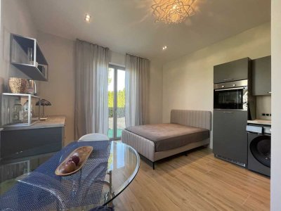 Erstbezug mit Terrasse und EBK: Geschmackvolle 1-Raum-Terrassenwohnung mit geh. Innenausstattung