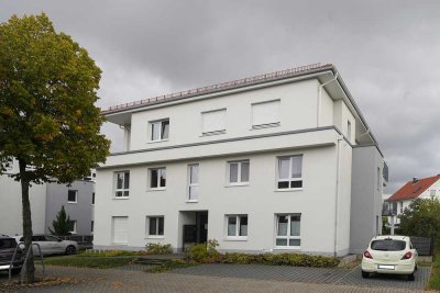 Neuwertige 4-Zi-Gartenwhng. mit ca. 110 m² Wfl., TG-Stellplatz+ EBK, barrierearm, zentrale Lage
