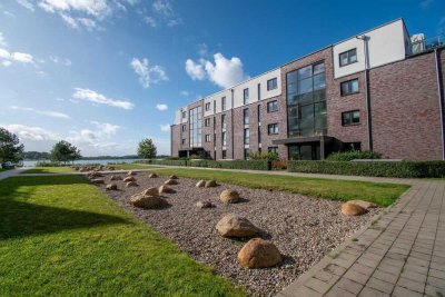 Hochwertige moderne Erdgeschosswohnung mit Terrasse und Tiefgaragenstellplatz an der Schlei