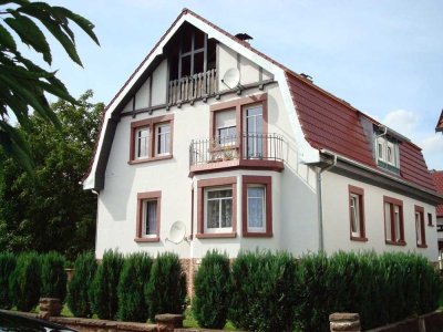 Modernisiertes Haus mit toller Maisonettewohnung inkl. Balkon, Loggia und sonnigem Garten