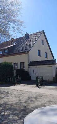 Charmante Doppelhaushälfte in Ostseenähe mit Wintergarten, Sonnenterrasse & Einliegerbereich