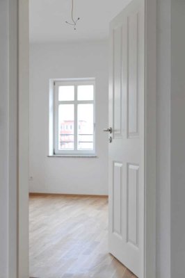 3 Zimmer + Balkon + Garten im Innenhof + fußläufig zum Stadion + Nachhaltige Energien