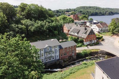 Kernsanierte Erdgeschosswohnung in der historischen Gremsmühle an der Schwentine