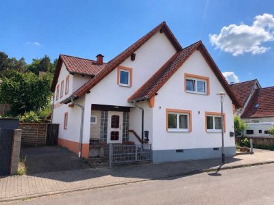 Großzügige Eigentumswohnung im Erdgeschoss mit Garten und sonniger Terrasse