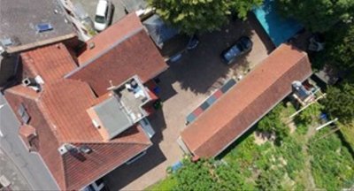 Attraktive Kapitalanlage mit 6 % Rendite. Zwei Wohnhäuser, modernes Loft & Gewerbeeinheit