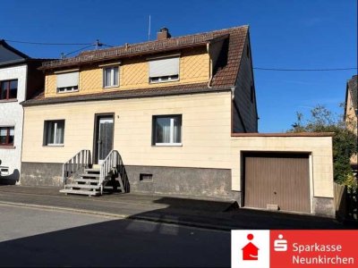 Ideal für Familien - Einfamilienhaus mit Garage und schönem Grundstück