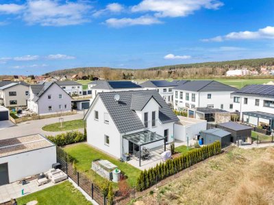 Wohntraum mit Stil und Energieeffizienz!
Neuwertiges KfW-55-Einfamilienhaus mit moderner Ausstattun