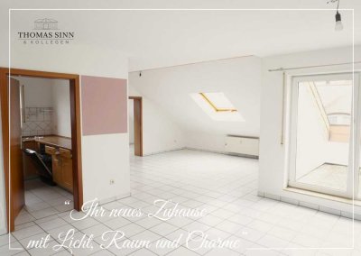 HELLE 2,5- BIS 3-ZIMMER-DG-WOHNUNG MIT AUßENSTELLPLATZ IN RUHIGER WOHNGEGEND