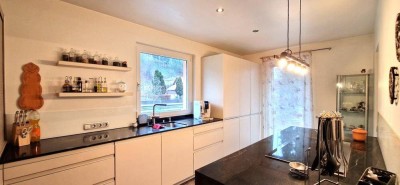 Energieeffizienter Bungalow mit Doppelgarage und Gemüsegarten in Hohenems
