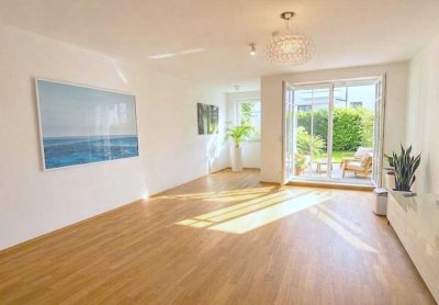 3-Zimmer-Gartenwohnung mit Südterrasse, Privatgarten, Energiek A und TG