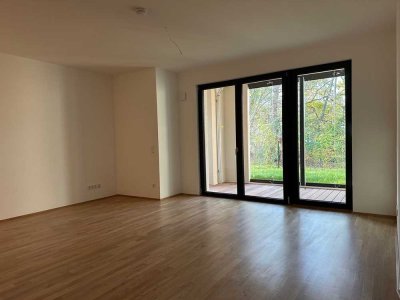 Traumhafte 2-Zimmer-Wohnung im Neubau inkl. Einbauküche, Logia, Terasse und 22m² eigenem Garten