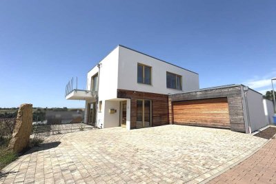 Modernes Einfamilienhaus mit Einliegerwohnung, Pool und traumhaftem Garten