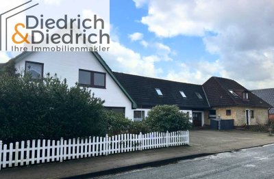 Verkauf eines vermieteten Zweifamilien- und eines Einfamilienhauses in gefragter Wohnlage in Heide-O