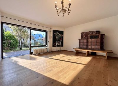 Zentrumsnahe Toplage im Grünen: EG-Wohnung mit Terrasse, Bergblick & großzügigem Hobbyraum