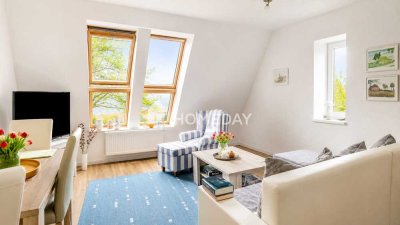 Ankommen und wohlfühlen: Drei Zimmer mit Balkon und Carport