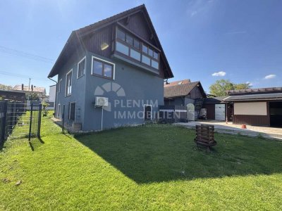 Modernes Raumwunder mit Wohnmobilgarage und Outdoor-Küche