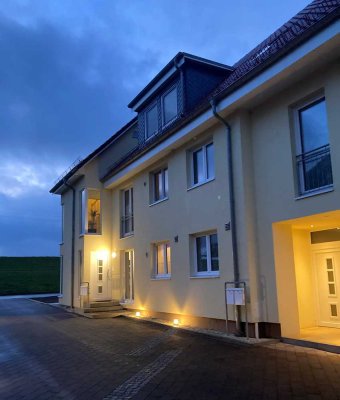 Moderne 2-Zimmer-Terrassenwohnung am Deich