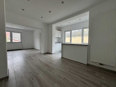 Erstbezug nach Kernsanierung: exklusive 1-Zimmer-Wohnung mit neuer Einbauküche in Graben-Neudorf