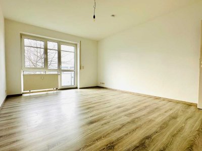 Hier wohnen oder investieren – lichtdurchflutete 1-Zimmer-Wohnung in Top-Lage mit Balkon und TG