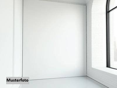 Attraktive DG-Wohnung mit Balkon und seltenem Gartenanteil