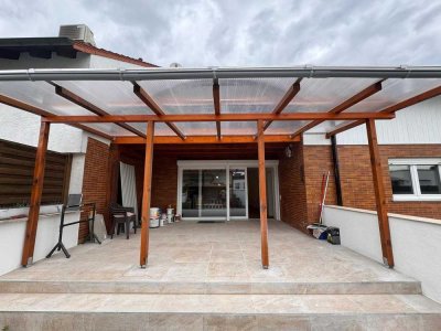 Erstbezug nach Sanierung: wunderschöne EG-3-Zimmer-Wohnung mit grosser Pergola in Neulußheim