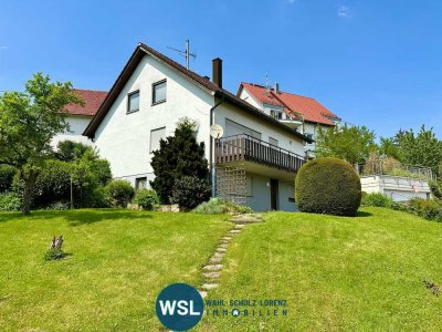 Grundsolides 2-Familienhaus mit Doppelgarage und Bauplatzreserve