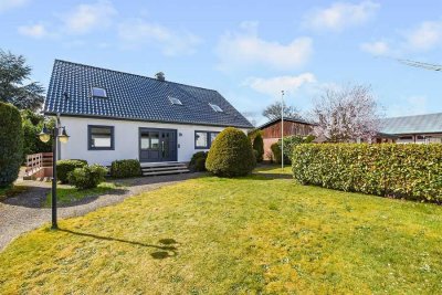 Großzügiges Wohnen trifft smarte Kapitalanlage – Einfamilienhaus mit Potenzial in Siek!