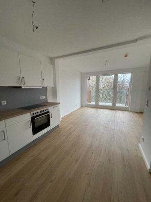 Helle 2-Zimmer Neubau-Dachgeschosswohnung mit Balkon