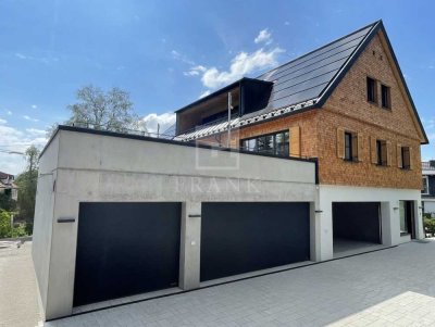 Exklusives Wohnen am Haubenschloß: 2,5-Zimmer-DG mit Loggia und Garage