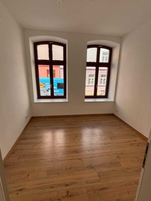 2,5-Raumwohnung im Erdgeschoss mit Einbauküche und Terrasse