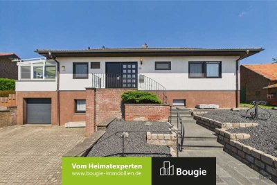 Geschmackvoller Bungalow mit Tageslichtkeller, Wintergarten und gepflegtem Garten