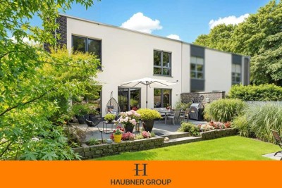 Design trifft Nachhaltigkeit – Doppelhaushälfte in Premiumlage direkt am Golfplatz