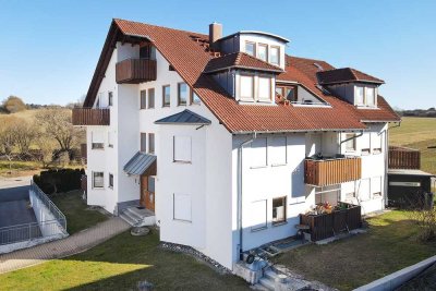 Wohnen direkt am grünen Ortsrand, moderne Maisonettwohnung mit Dachterrasse