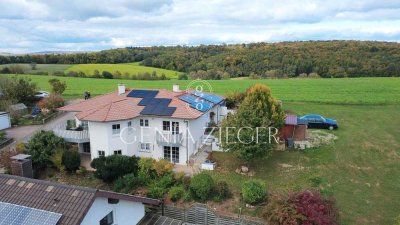 Wohnen mit Weitblick – Einfamilienhaus in traumhafter Hang- und Feldrandlage