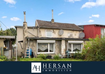 Sanierungsbedürftiges Reihenendhaus in Herzogenrath-Kohlscheid!