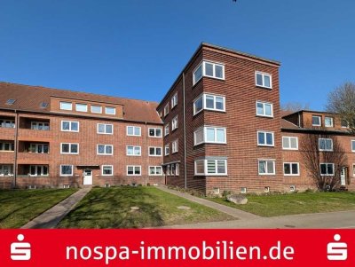 3-Zimmer-Wohnung im ersten Obergeschoss mit kleiner Loggia
