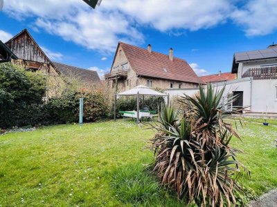 Traumwohnung (Erdgeschoss) mit Terrasse und großzügigem Gemeinschaftsgarten in Bad Krozingen!