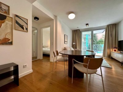 Stillvoll möblierte Wohnung in zentraler Lage mit Balkon