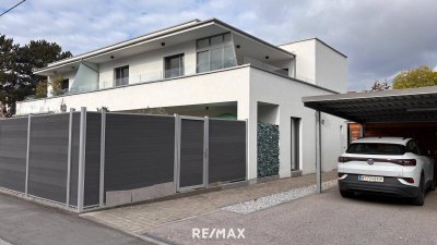Exklusive Wohnung mit Garten und privatem Pool