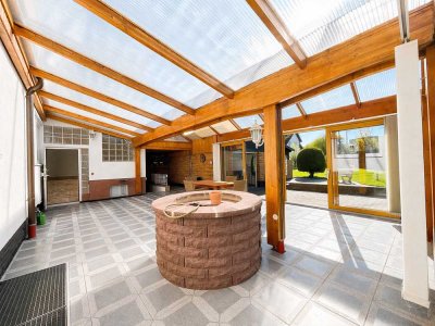 Attraktives Einfamilienhaus in Harleshausen mit Wintergarten, Terrasse und großzügigem Garten.